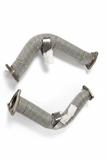 Vorsprung Autowerk test pipes for Audi Q7 4M 3.0 Supercharged CREC 2017-2019, showing metallic exhaust components.
