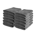 12-pack of dark gray microfiber detailing towels stacked on white background