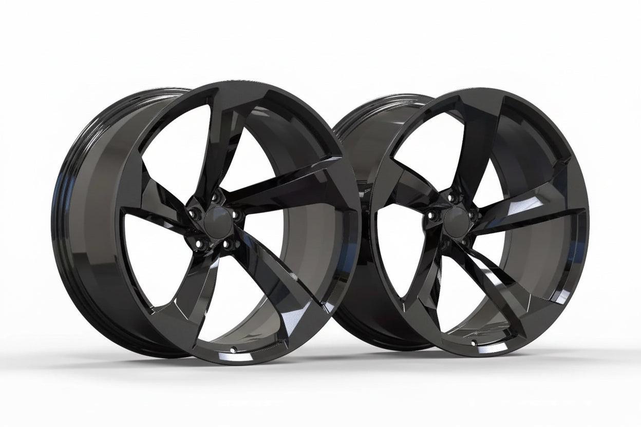 Gloss black five-spoke alloy wheels for Audi performance cars on white background