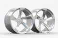 Pair of silver five-spoke alloy wheels for high-performance Audi vehicles