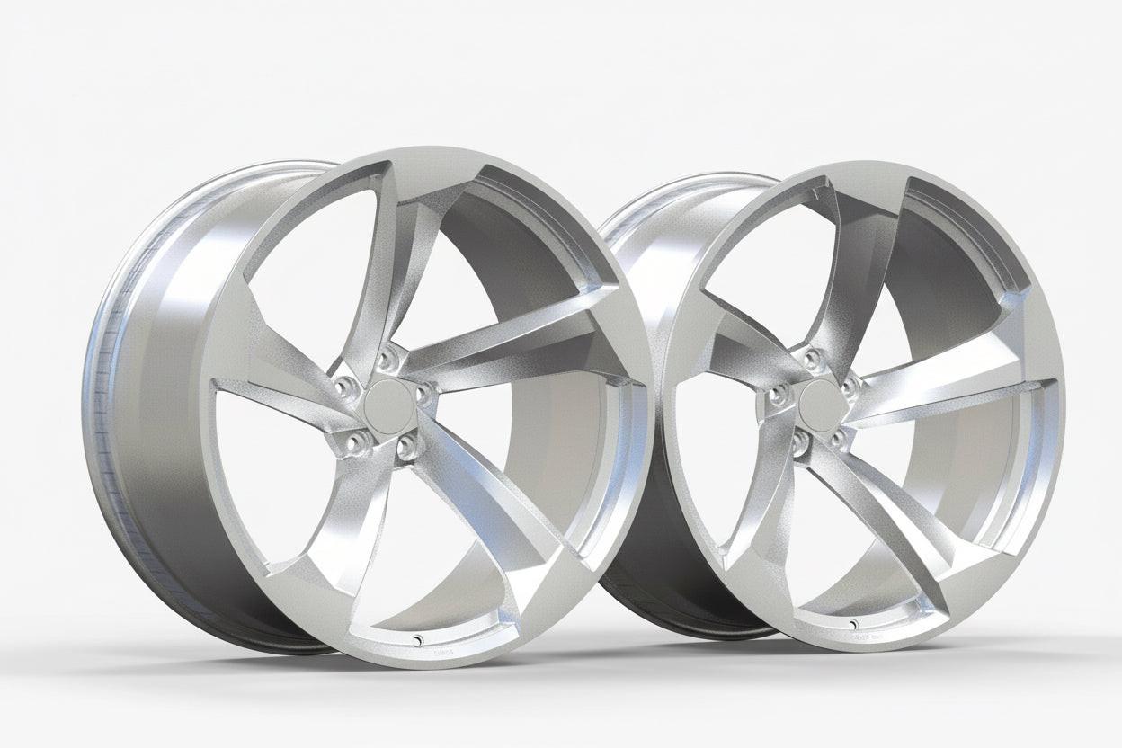 Pair of silver five-spoke alloy wheels for high-performance Audi vehicles