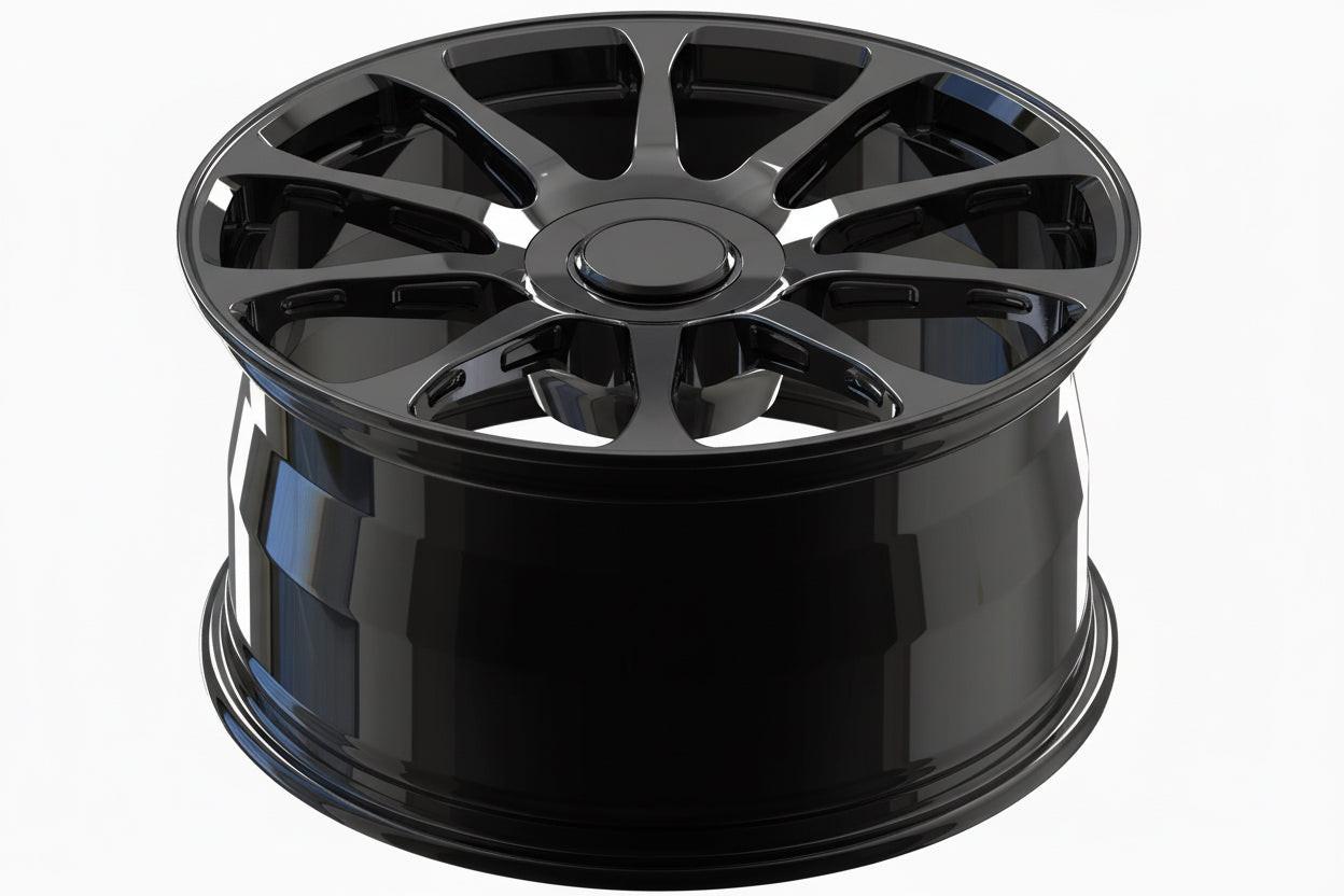 Glossy black alloy wheel with multi-spoke design for high-performance Audi vehicles