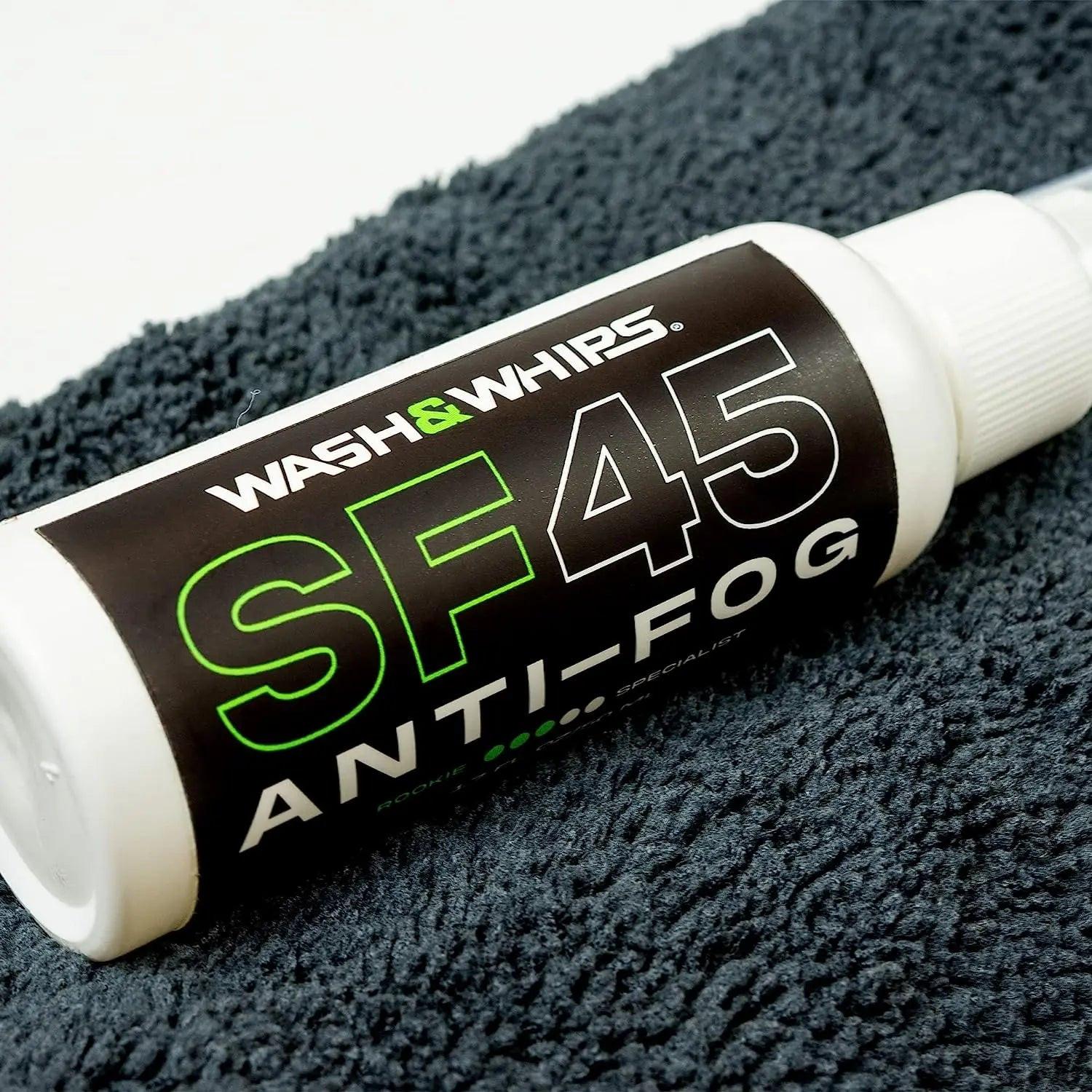 WASH & WHIPS SF45 anti-fog spray for car windshields shown in a spray bottle with label.