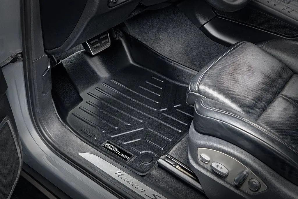 Custom-fit all-weather floor mat in Audi car interior, protecting footwell and carpet