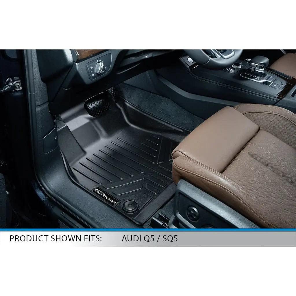 Custom fit black floor mat installed in Audi Q5 SQ5 front interior, brown seat visible
