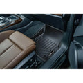 Custom-fit black car floor mat installed in Audi front passenger seat area.