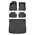 Set of black all-weather car floor mats and trunk liner with raised edges, custom-fit for Audi.