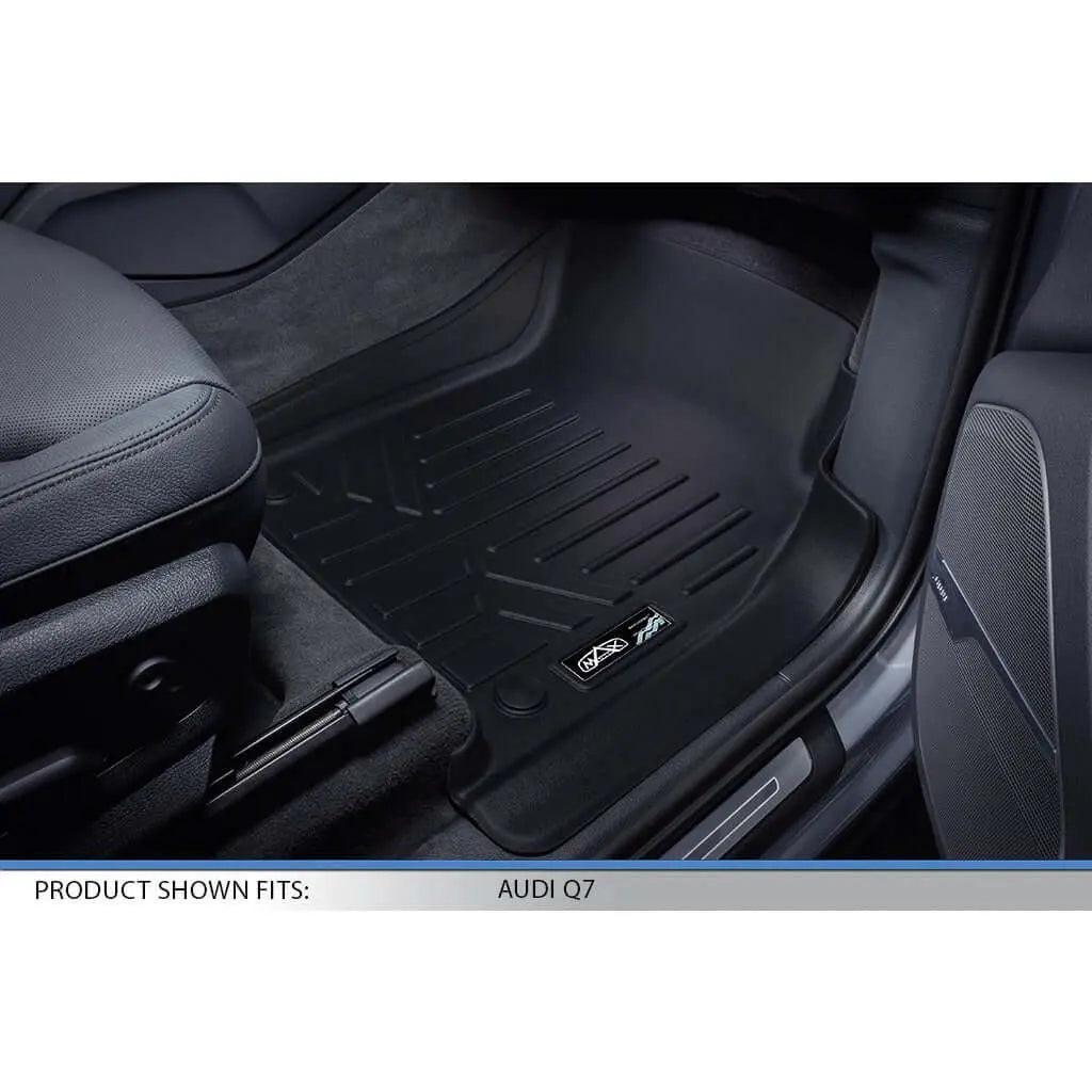 Custom black all-weather floor mat installed in an Audi Q7 front passenger footwell.