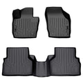 Set of black custom-fit Audi rubber floor mats with raised edges and textured grooves