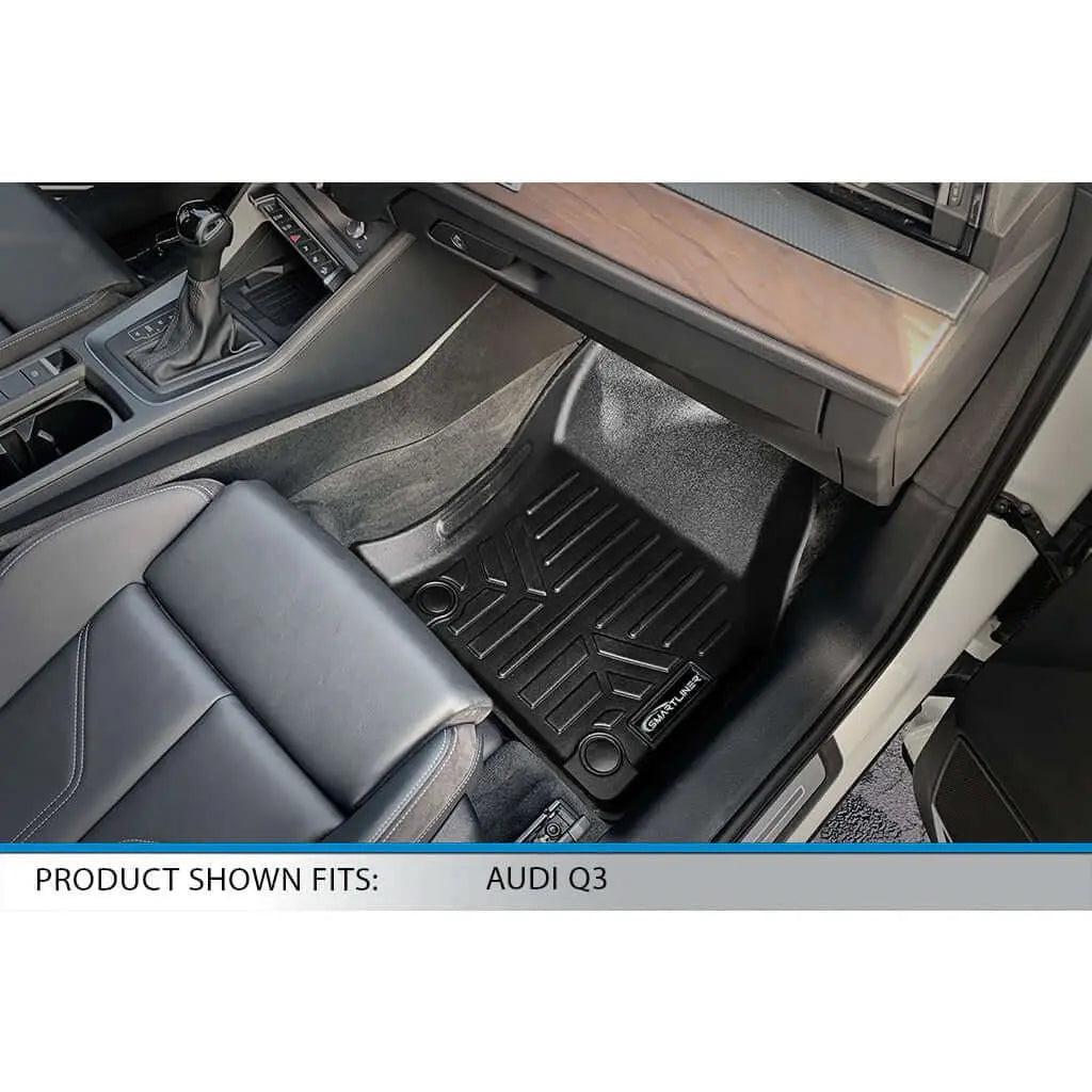 Black all-weather floor mat installed in Audi Q3 front passenger footwell