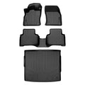 Set of custom black Audi all-weather floor mats and trunk liner on white background