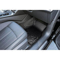 Passenger side Audi interior with custom-fit black all-weather floor mat installed.