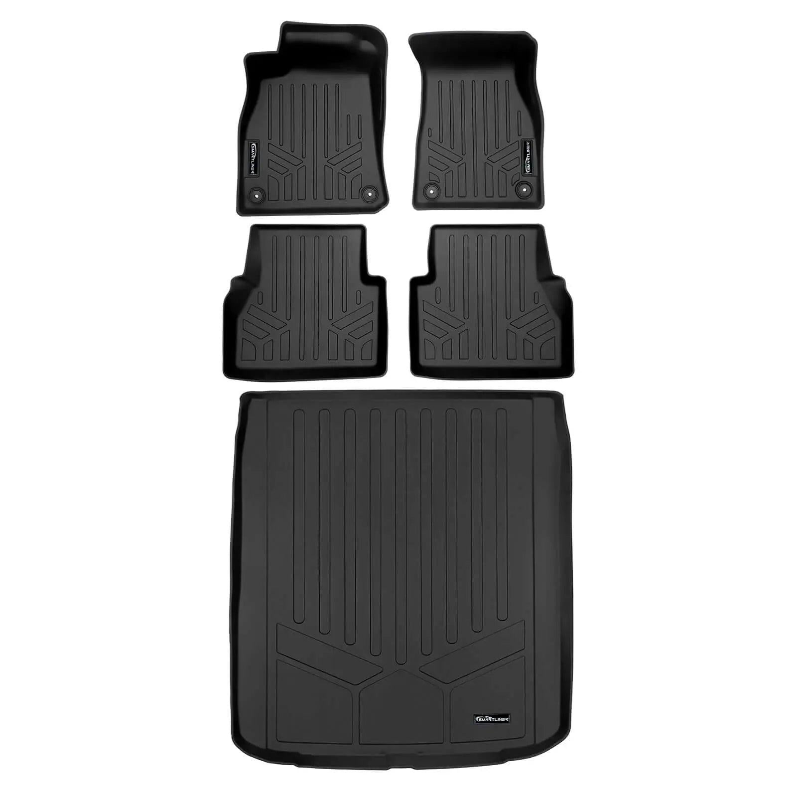 Set of black custom-fit Audi floor and cargo mats with raised edges and textured grooves