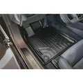 Audi e-tron GT black all-weather floor mat installed in driver footwell