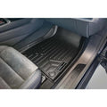 Custom-fit black floor mat in Audi e-tron GT front passenger footwell interior