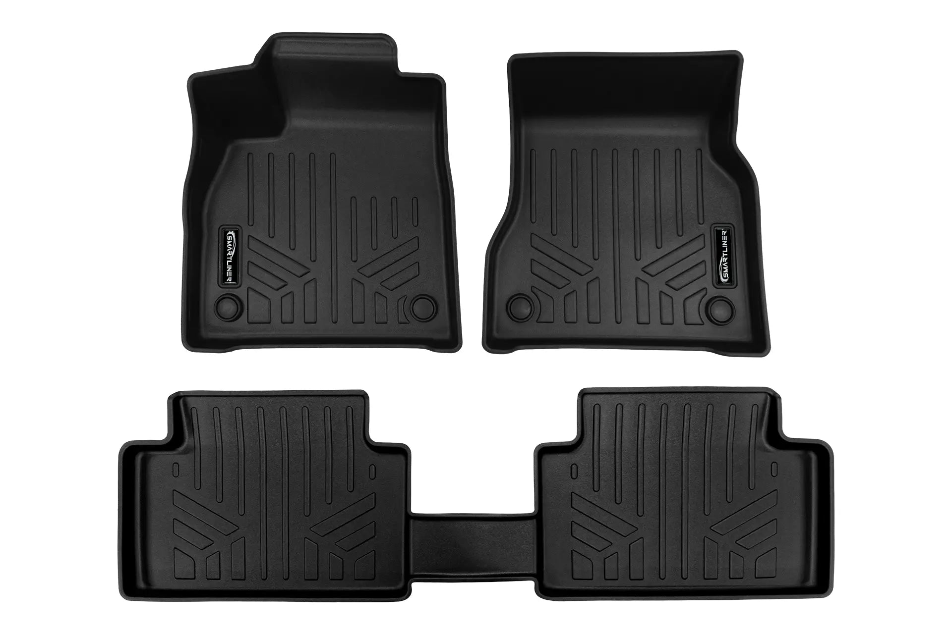 Custom-fit black rubber car floor mats set with raised edges and textured grooves