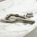 Stainless steel Audi A3 S3 AWD downpipe exhaust kit on white marble surface