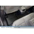 Custom rear floor mat for Audi E-Tron, black all-weather, installed in backseat interior.