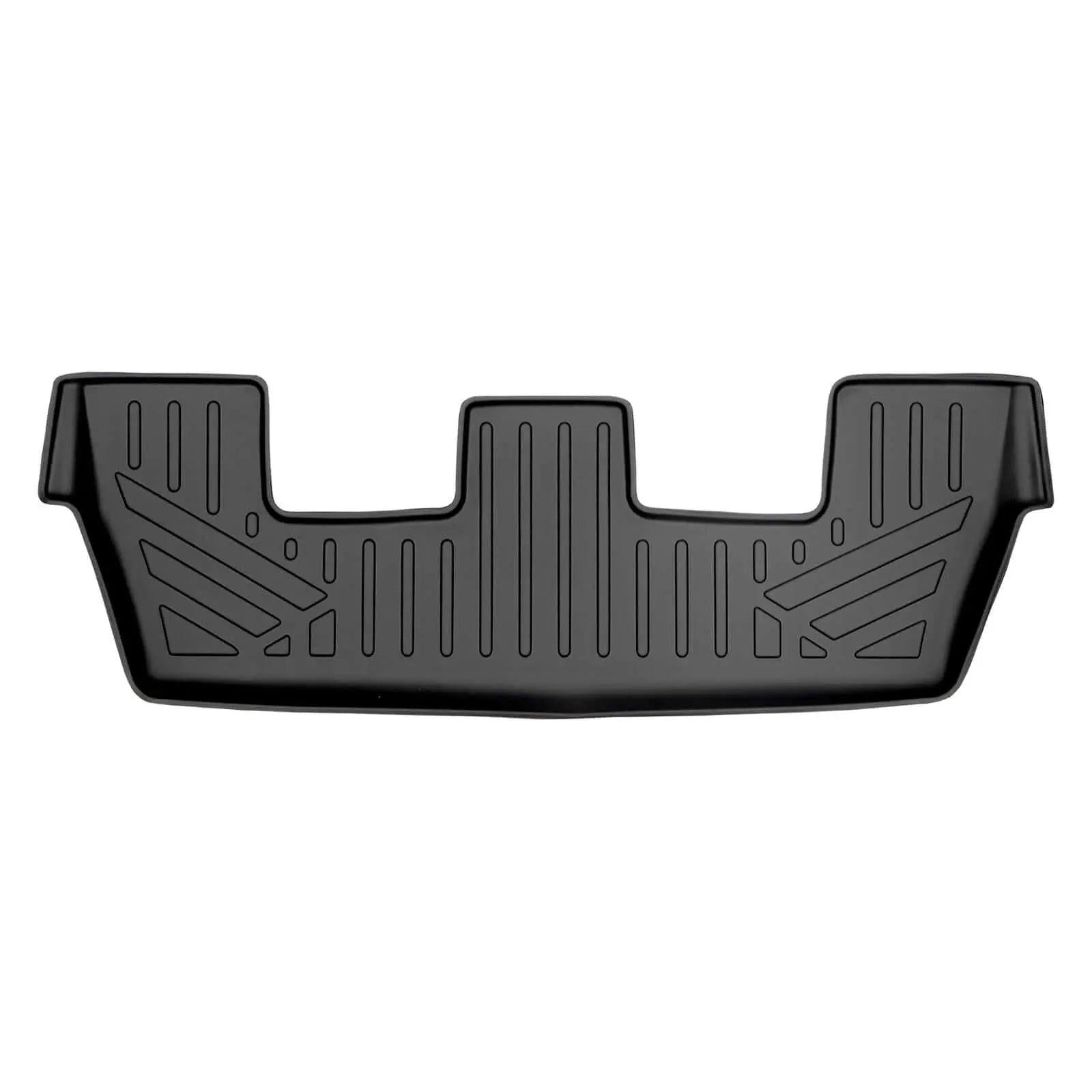 Custom-fit black Audi trunk mat with raised edges and geometric tread pattern