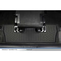 Custom-fit rear floor mat for Audi Q7, black, with raised edges and textured pattern.