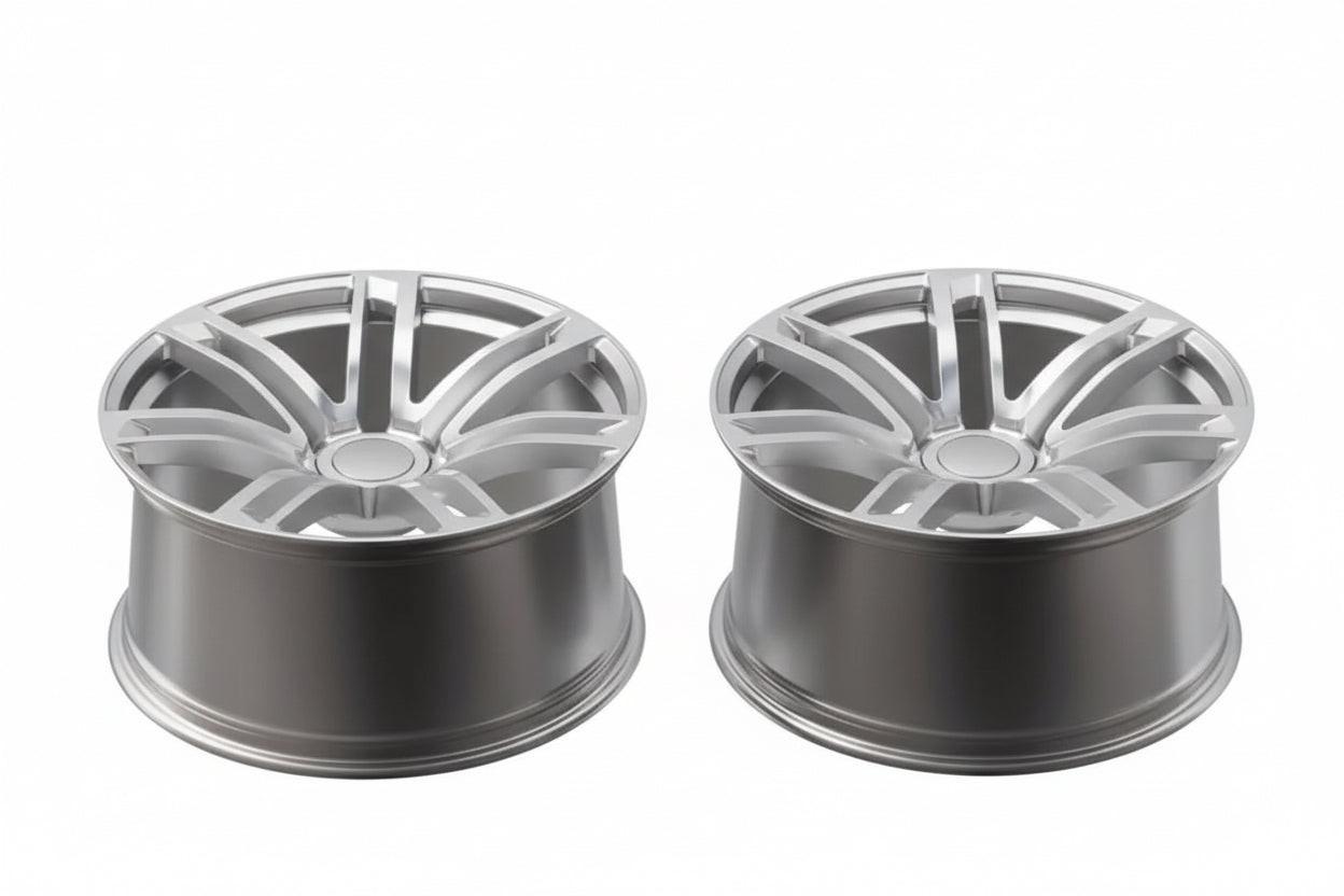 Pair of silver alloy performance wheels with split-spoke design on white background