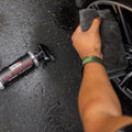 WASH & WHIPS Wheel and Tire Wash & Shine Kit showing bottles and cleaning tools for car wheel and tire cleaning.