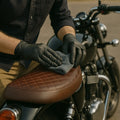 WASH&WHIPS MotoPro motorcycle detailing kit with car wash supplies, including brushes and cleaning products for shine and protection.