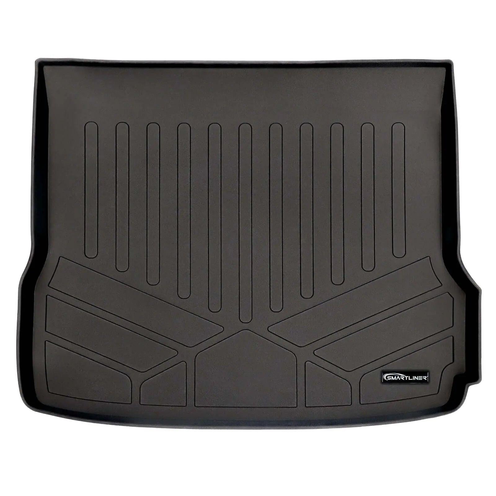 Black custom-fit trunk liner mat with raised edges and textured grooves, Smartliner logo