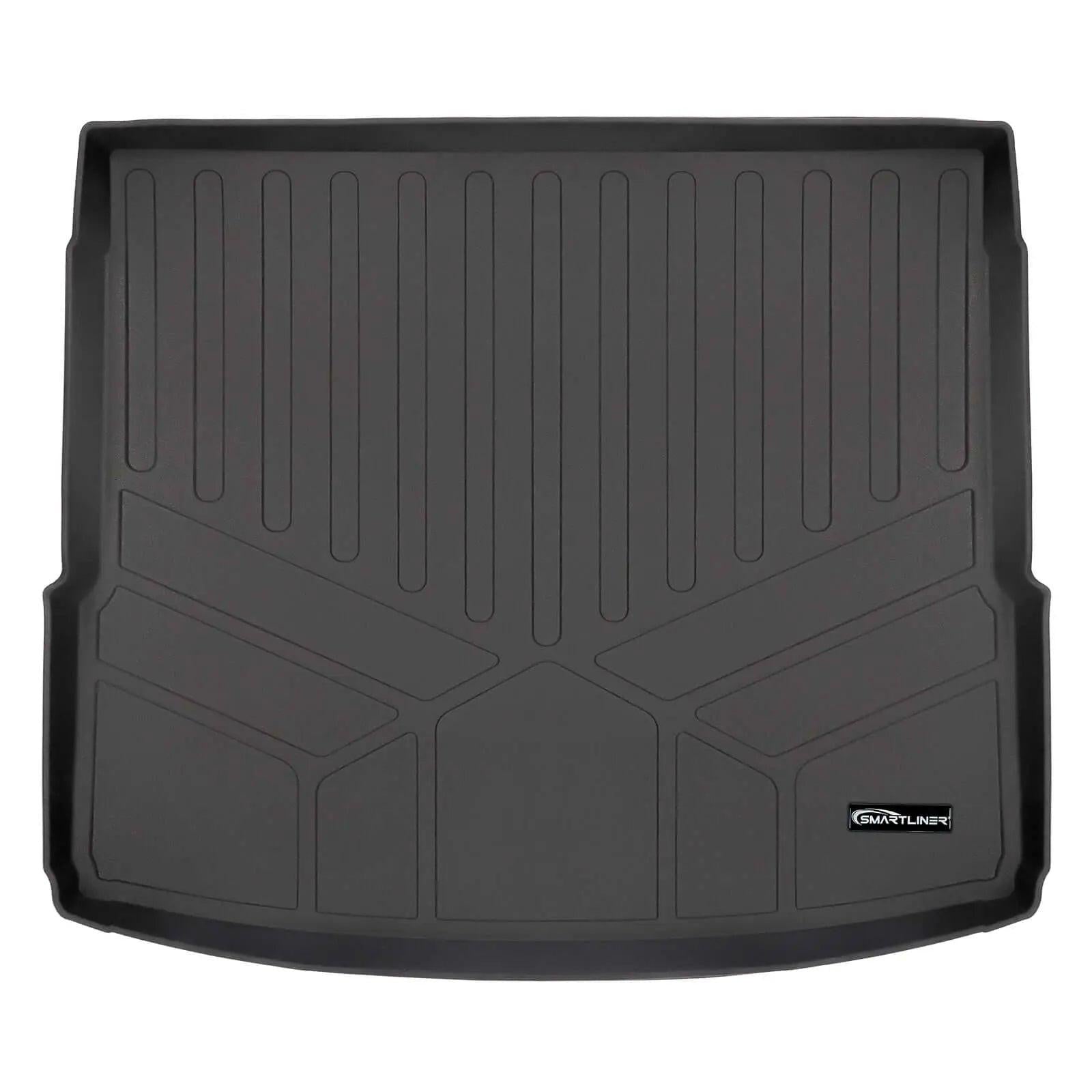 Black custom-fit Audi trunk cargo liner with raised edges and Smartliner logo