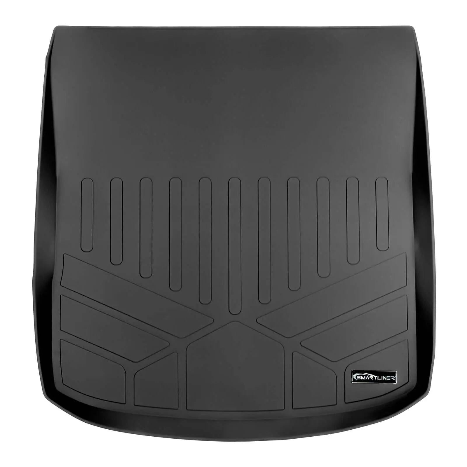 Black custom-fit trunk cargo liner mat with raised edges for Audi, SMARTLINER logo visible.