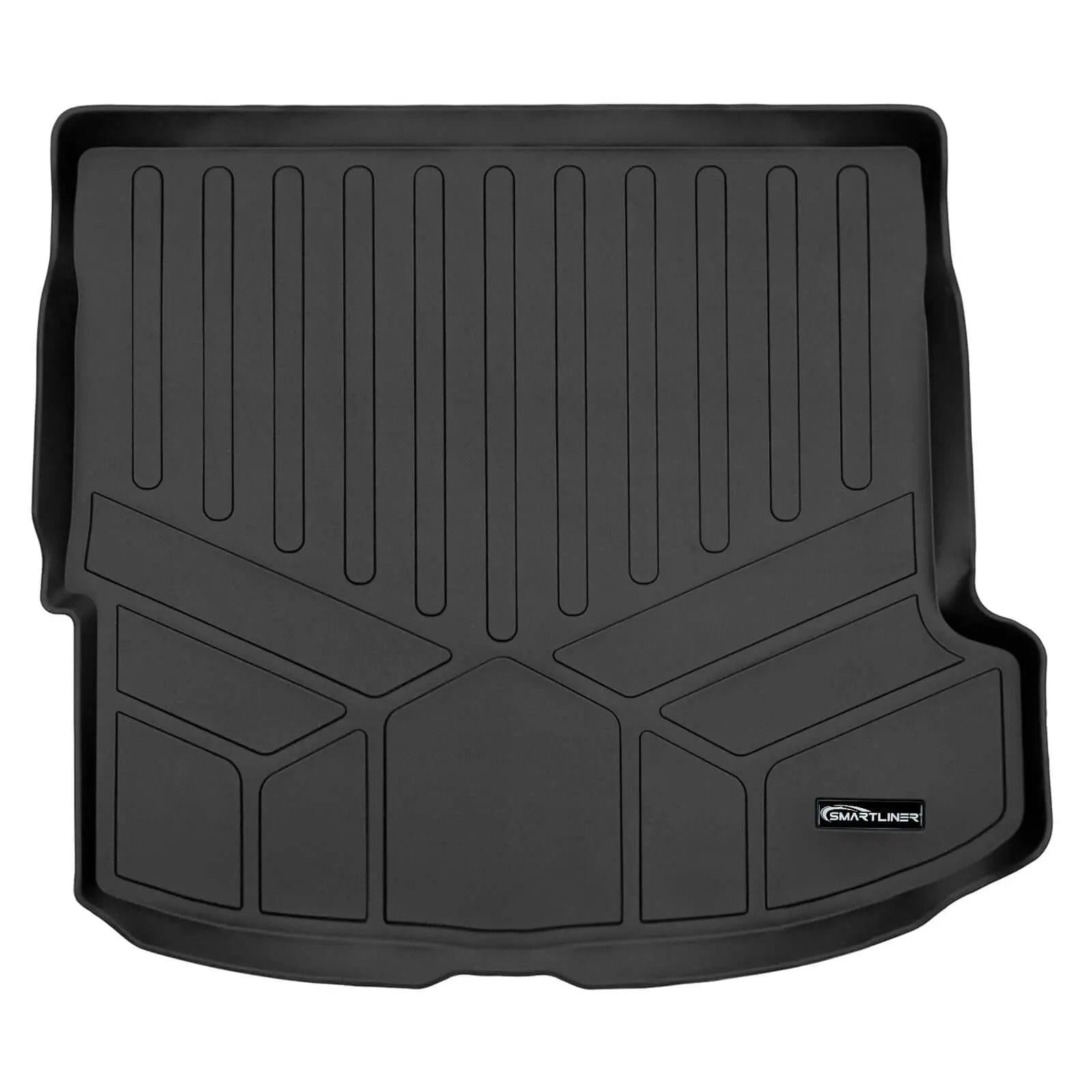 Black custom fit trunk cargo mat with raised edges for Audi, Smartliner logo visible