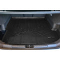 Custom fit black trunk liner mat installed in car trunk with raised edges