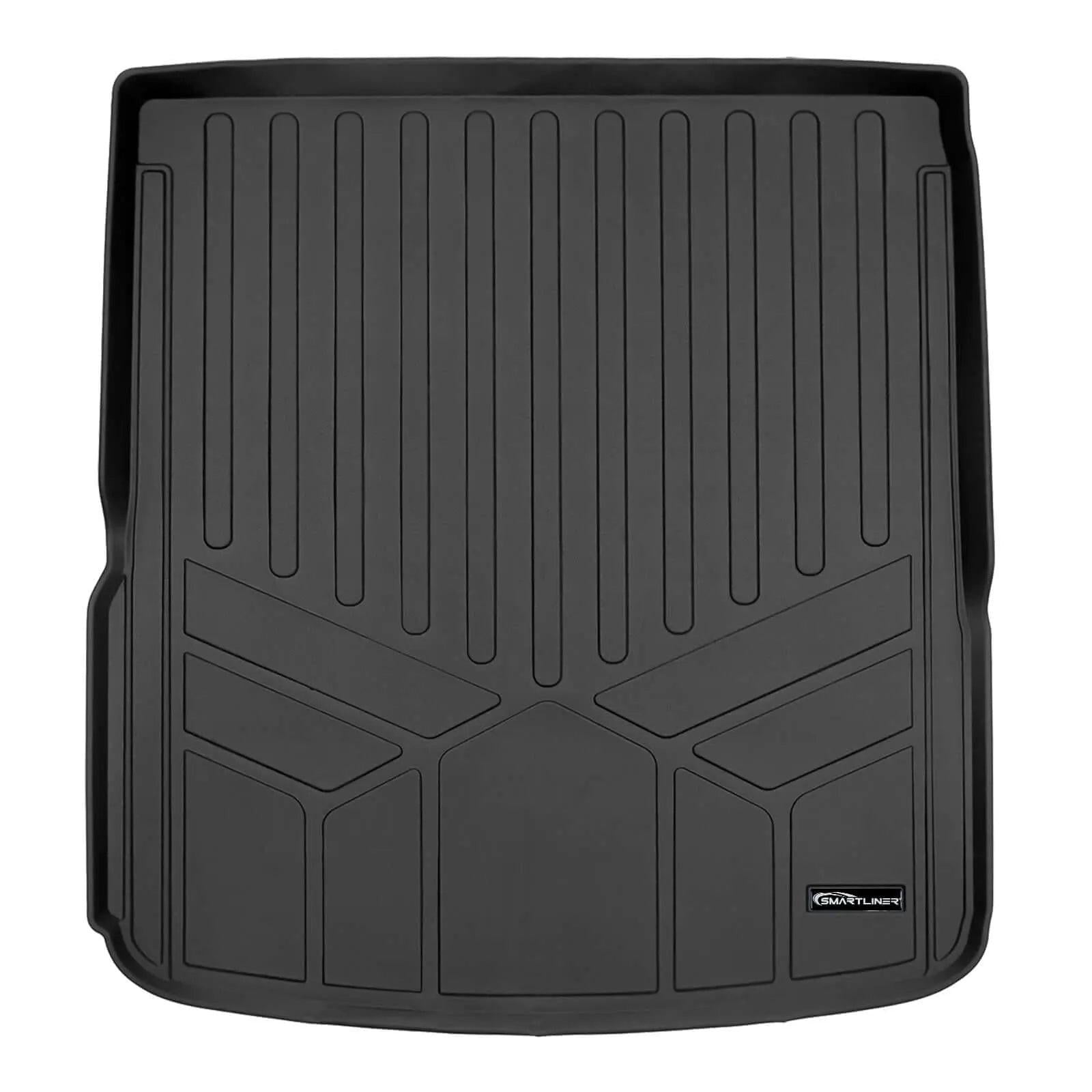 Black custom-fit Audi trunk liner with raised edges and textured grooves