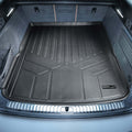Custom-fit Audi trunk liner in black with raised edges, shown installed in vehicle cargo area