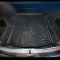 Audi trunk with fitted black Smartliner cargo mat, durable and custom molded for protection