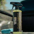 WASH&WHIPS Musk Odor Eliminator 16oz bottle with label, designed to remove unpleasant odors from fabrics and surfaces