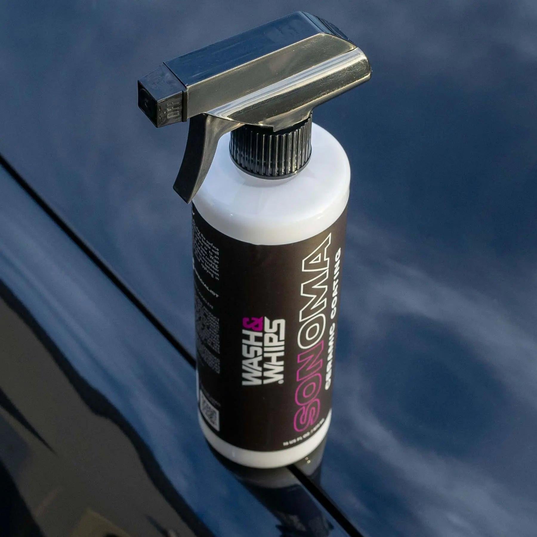 Sonoma Wash & Whips ceramic coating spray bottle on a glossy car surface