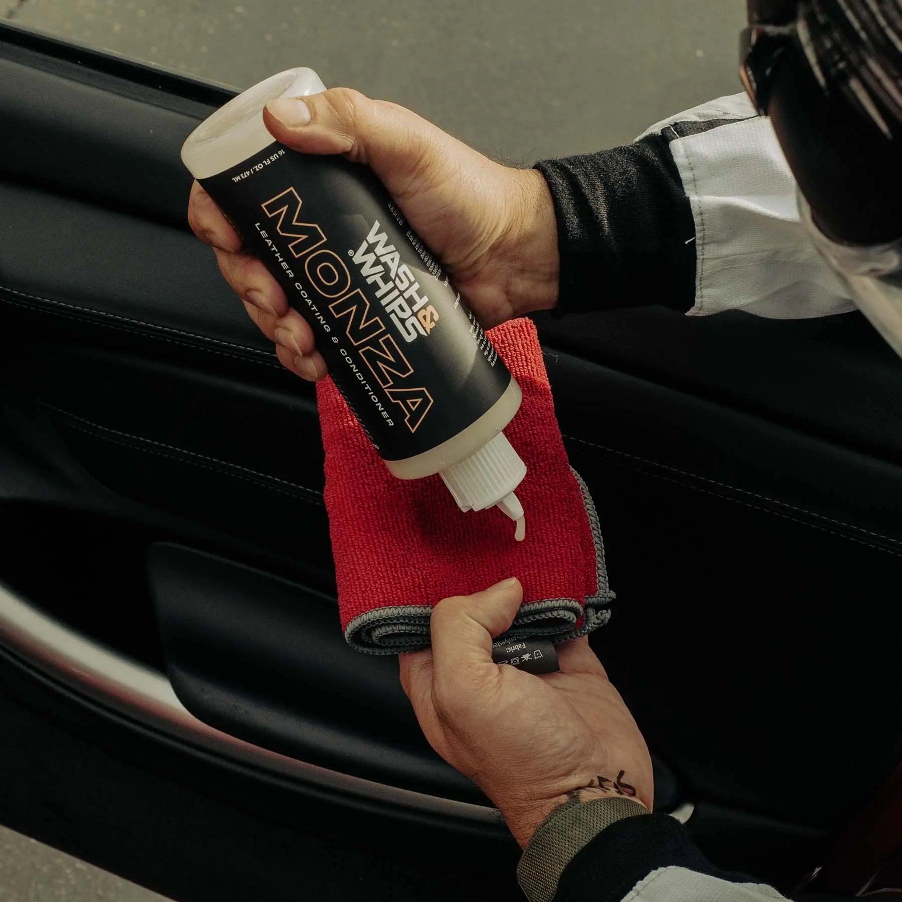 WASH&WHIPS Monza leather coating and conditioner bottle shown, designed to clean and condition leather surfaces.