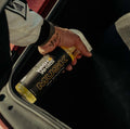 WASH & WHIPS Musk Odor Eliminator in 16oz bottle, showing the product label and packaging on a plain background