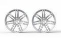 Pair of silver multi-spoke alloy wheels for Audi performance upgrade on white background