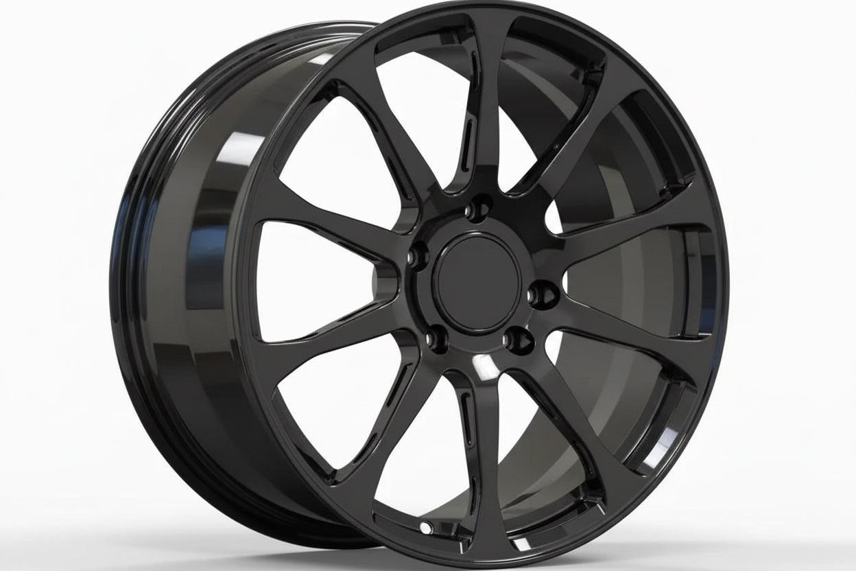 Gloss black multi-spoke alloy wheel for Audi performance vehicles on white background