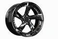 Gloss black multi-spoke alloy wheel with detailed rivets for performance cars