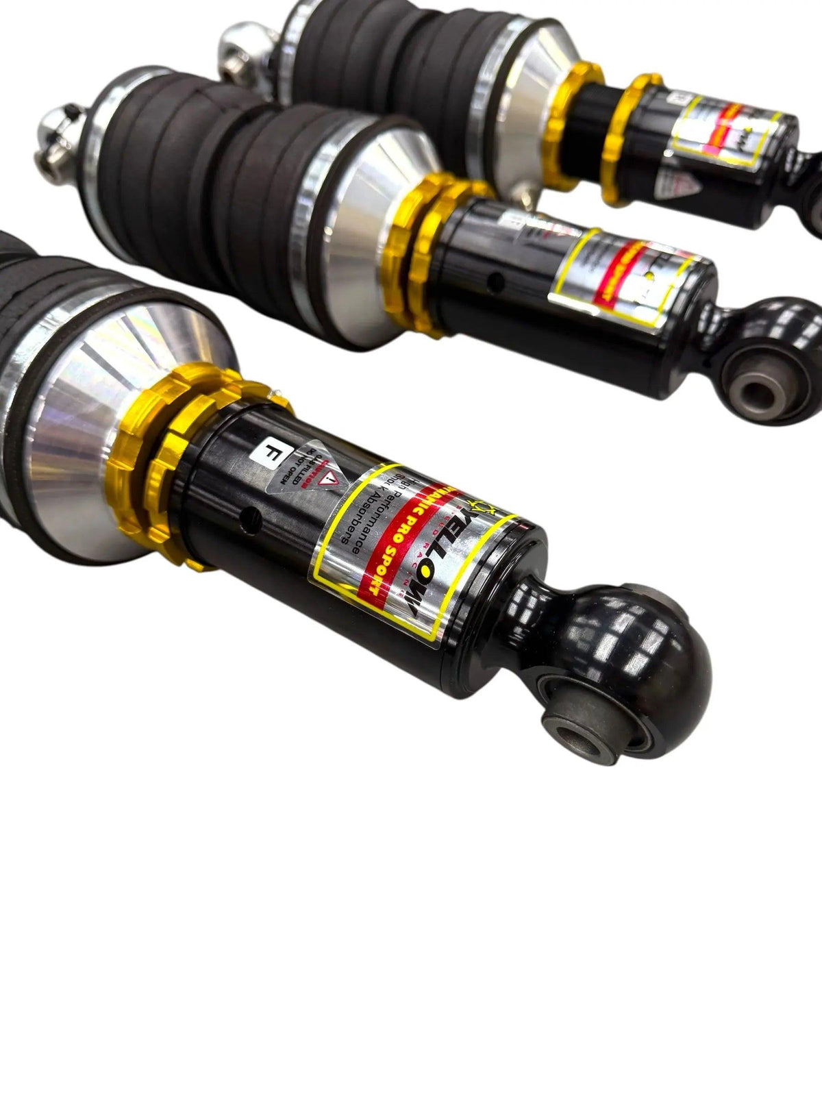 Yellow Speed Racing Dynamic Pro Air Struts for Audi R8 2008-2015, Type 42, showing sleek black air struts with mounting components.