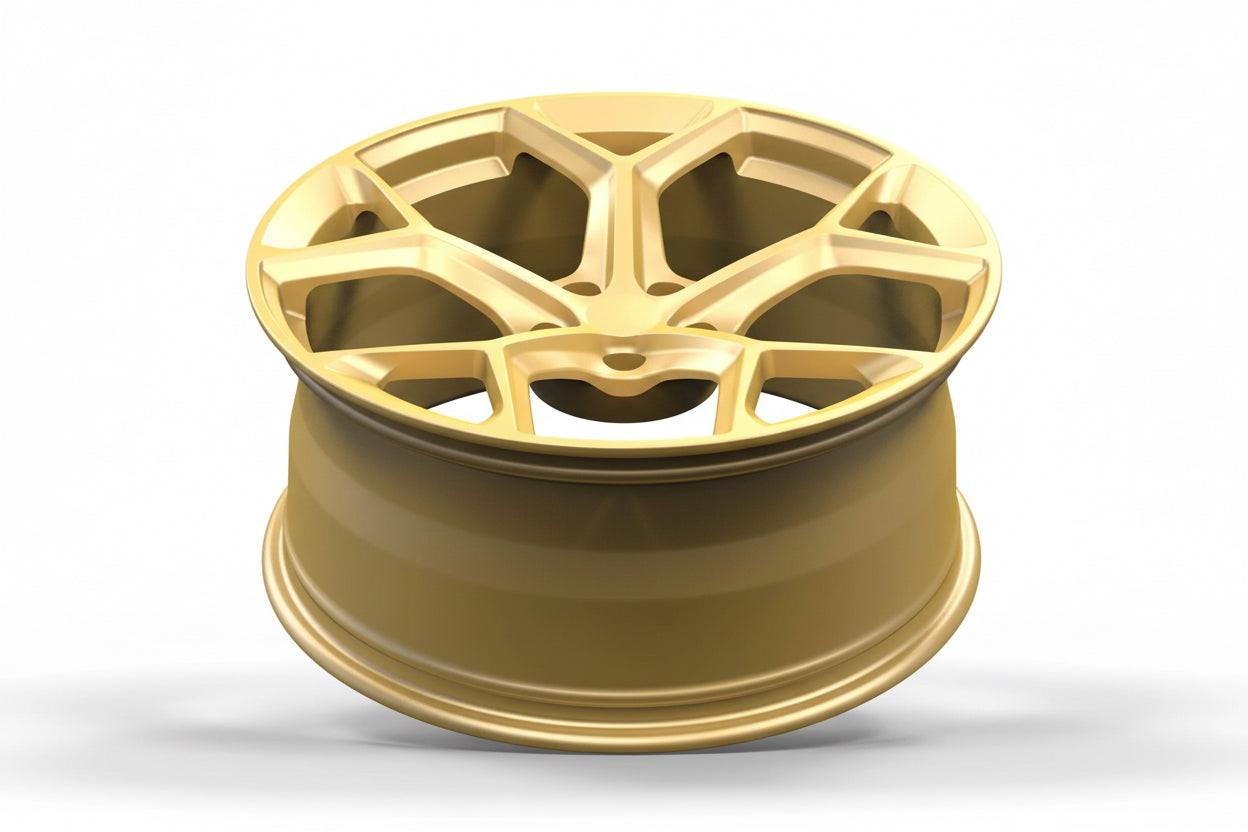 Gold alloy wheel with modern multi-spoke design for Audi performance vehicles