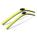 Pair of yellow aerodynamic windshield wiper blades for Audi vehicles on white background