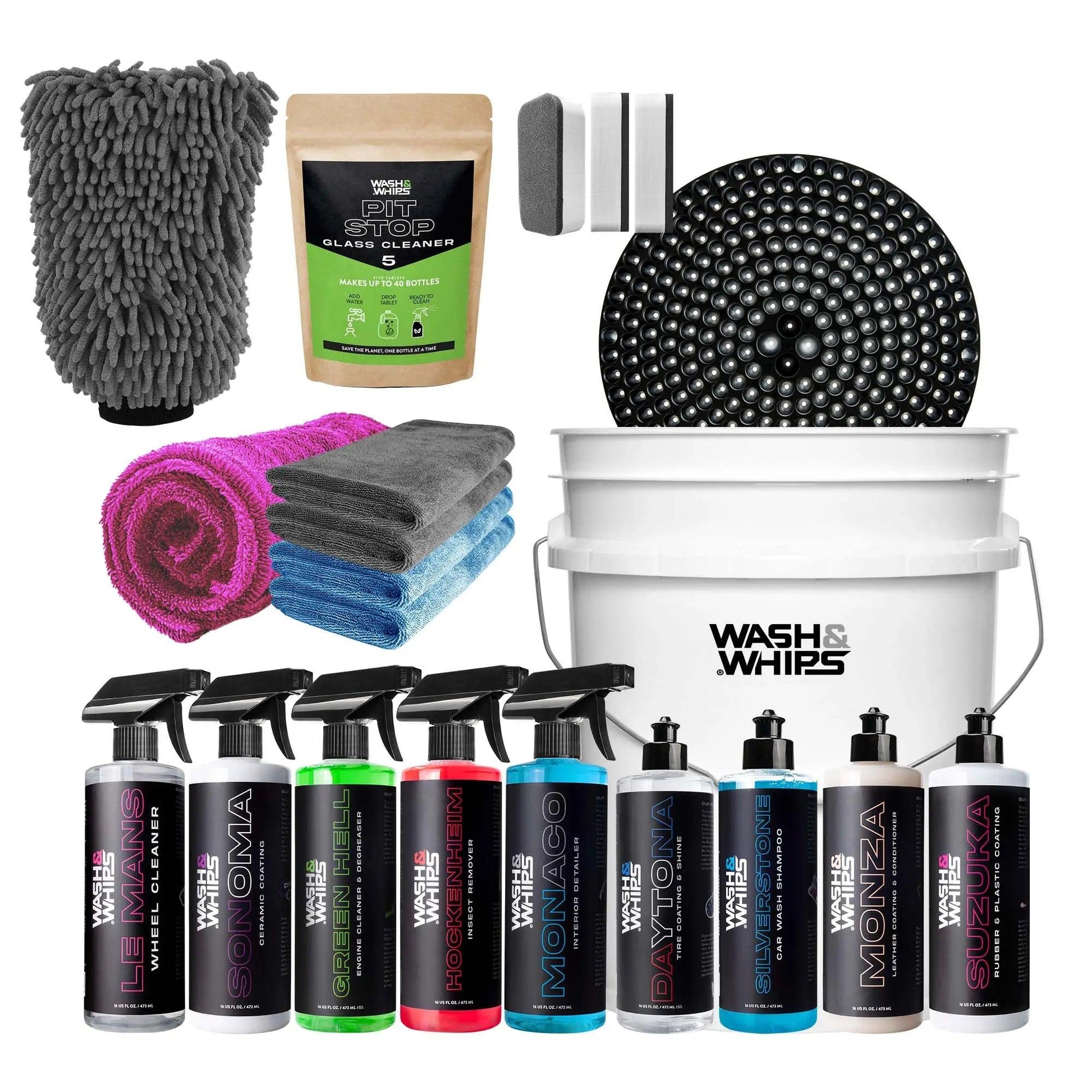 Comprehensive car detailing kit with cleaning sprays, microfiber towels, wash mitt, bucket, and grit guard.