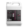 Suzuka Rubber and Plastic Coating by WASH&WHIPS in a sleek black container with the product label visible.