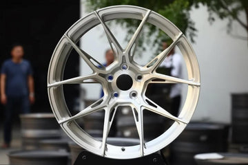 Set of Vorsprung forged VA-002 style wheels by Vorsprung Autowerk featuring a sleek, modern design with a polished finish.