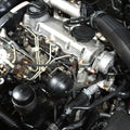 Stainless and billet ZSPEC Stage 1 Dress Up Bolts® fastener kit for 1999-2003 VW Golf MK4 1.9L Diesel engine, shown on engine bay.
