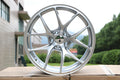 19-inch Vortex Style WheeloutletNJ wheels in sleek hyper black finish with seven-spoke design and machined accents.